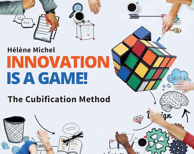 Cover of “Innovation is a game! The Cubification Method” by Hélène Michel: a Rubik’s Cube on a work table surrounded by sketches