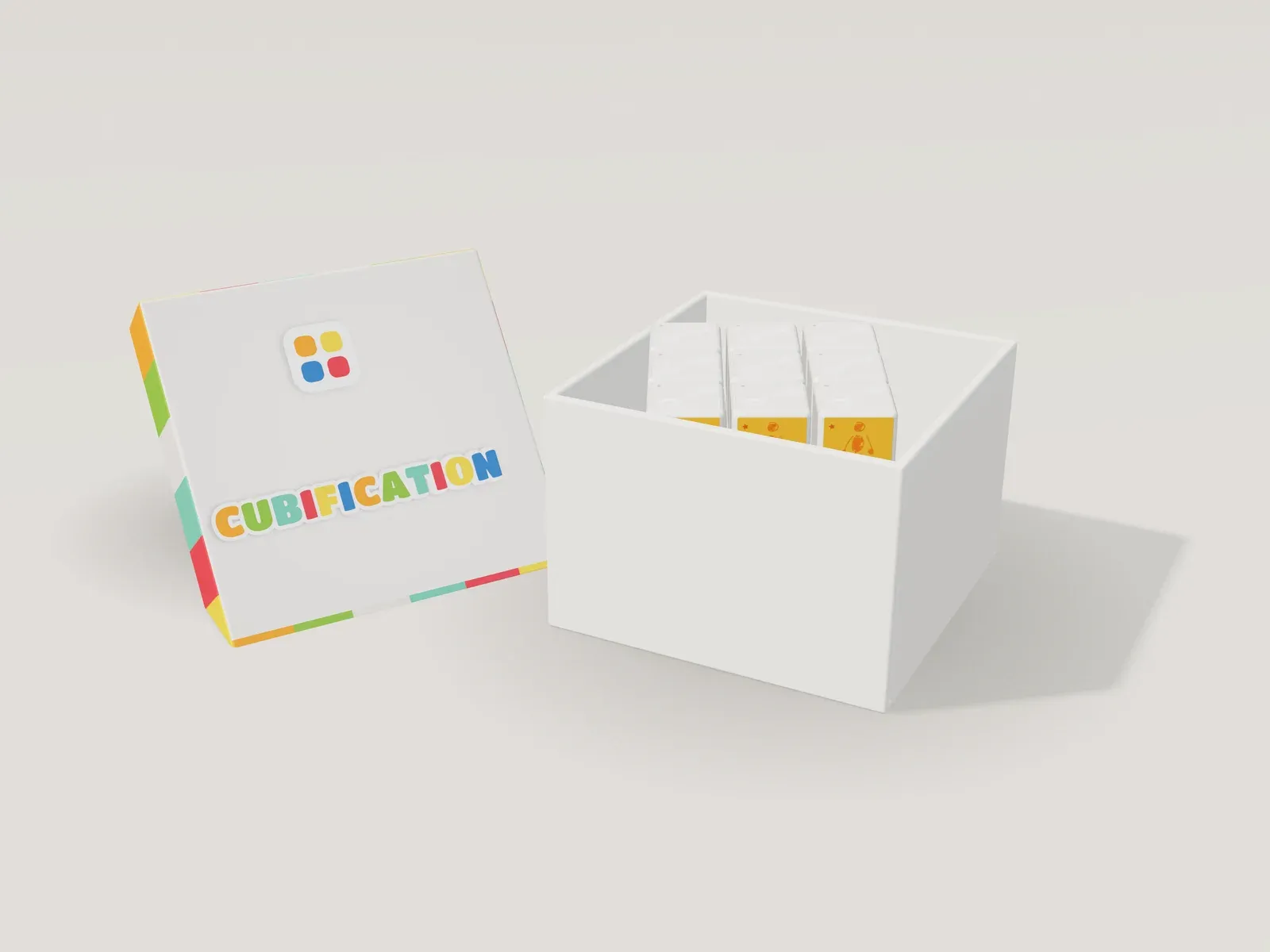 La boîte du kit Cubification, couvercle crème au wordmark coloré et bande des six faces.